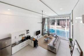 Elegant Pool Access Townhouse Near Beach